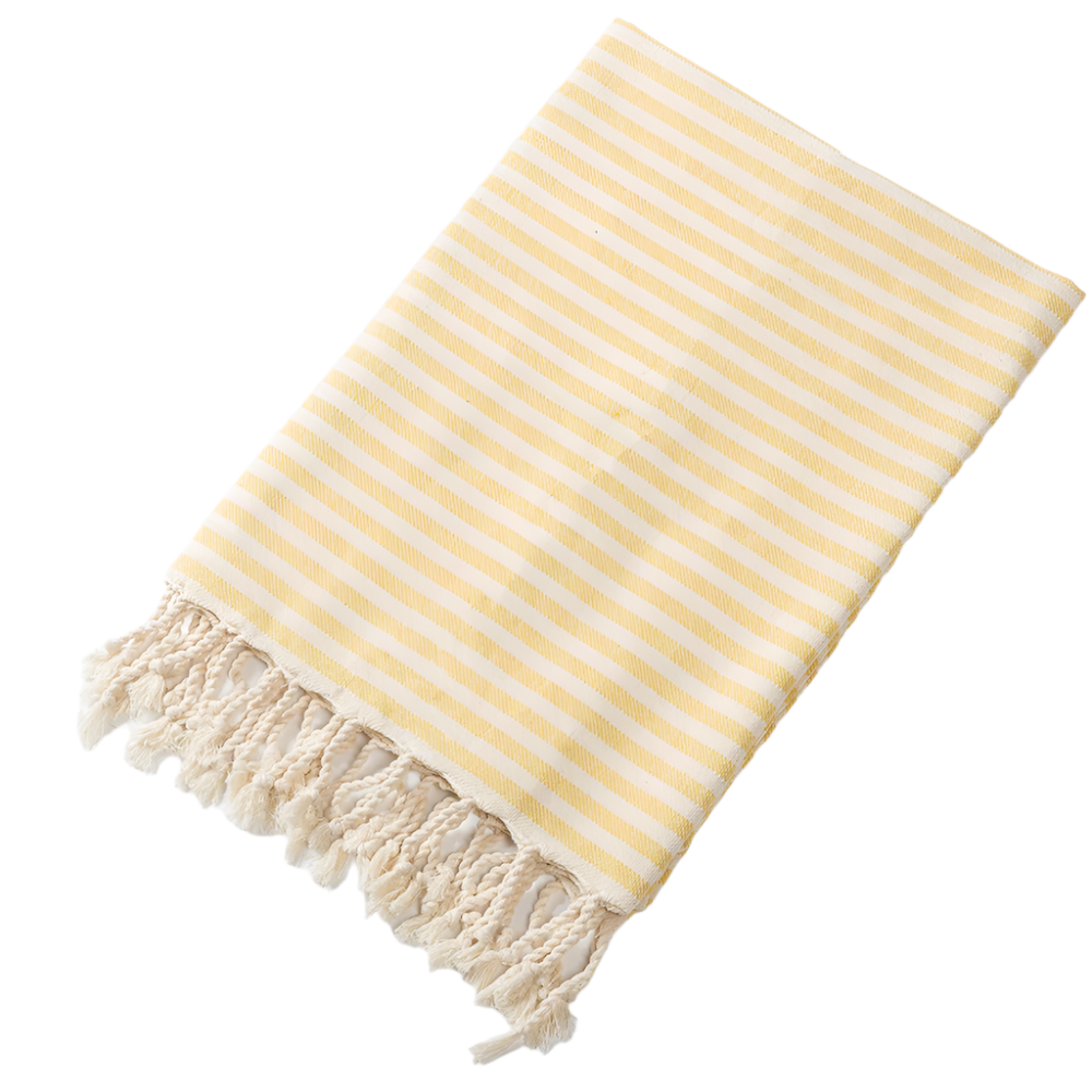 Yellow and white striped towel with tassels on a light background